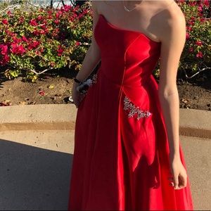 Beautiful red prom dress available with sequins and pockets! Only worn once
